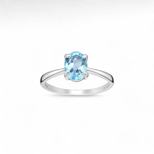 Sterling Silver Solitaire Ring Decorated with Topaz